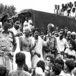 Gandhiji_and_Sub-Inspector_Qurban_Ali_in_Champaran_1917